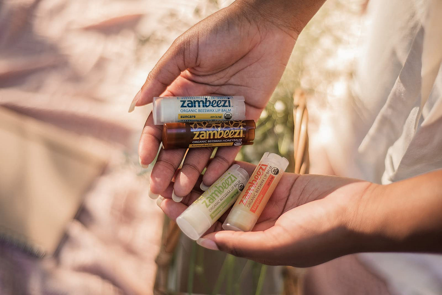 ZAMBEEZI Fair Trade, Organic Beeswax Lip Balm - Variety 4 Pack (Lemongrass, Tangerine, Suncare and Honeybalm) - Ethically Sourced Beauty and Personal Care Zambeezi