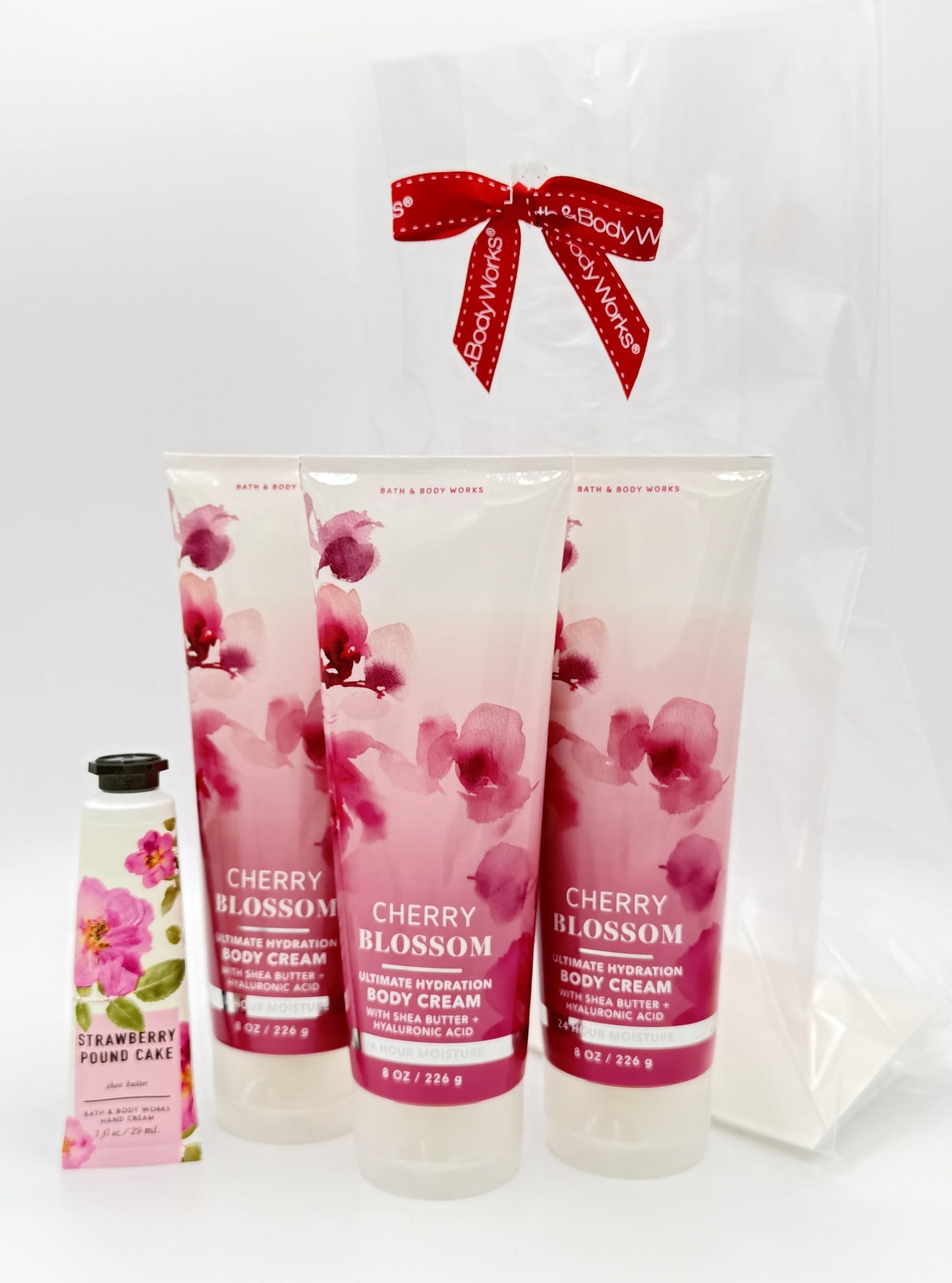 Bath & Body Works Cherry Blossom 4-Piece Gift Set | Includes: Three Ultimate Hydration Body Creams and One Strawberry Pound Cake Hand Cream Beauty & Personal Care Bath & Body Works