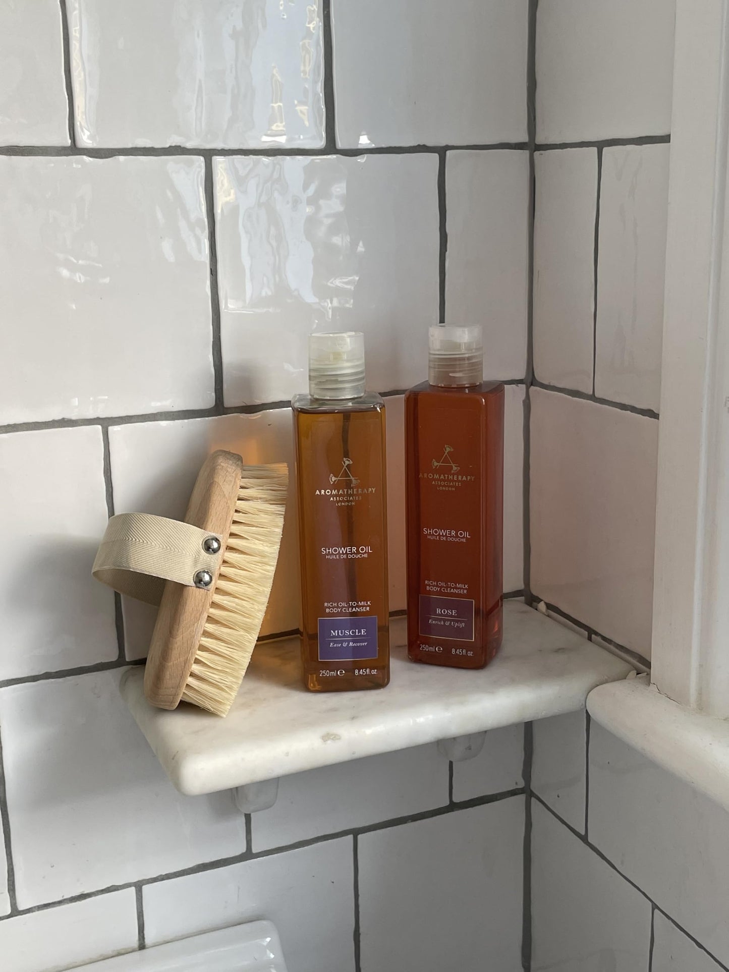 Aromatherapy Associates Mini Shower Oil Travel & Discovery Collection. 4 Premium Shower Oils (50ml each) and Handy Travel Case. Includes Revive Beauty and Personal Care Aromatherapy Associates