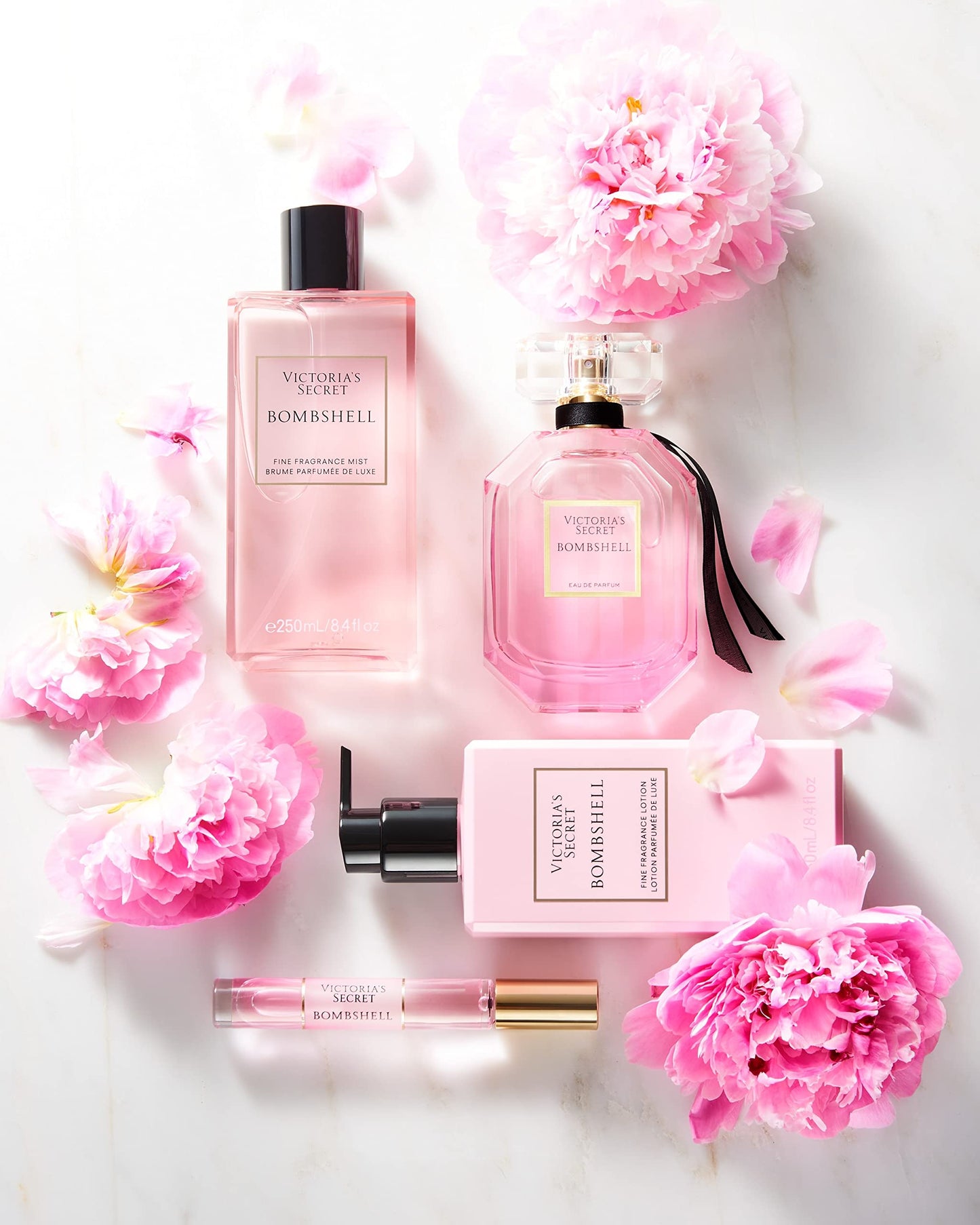Victoria's Secret Bombshell Mini Fragrance Mist, Notes of Purple Passion Fruit, Shangri-La Peony & Vanilla Orchid, Travel Size Body Spray for Women Beauty & Personal Care Victoria's Secret