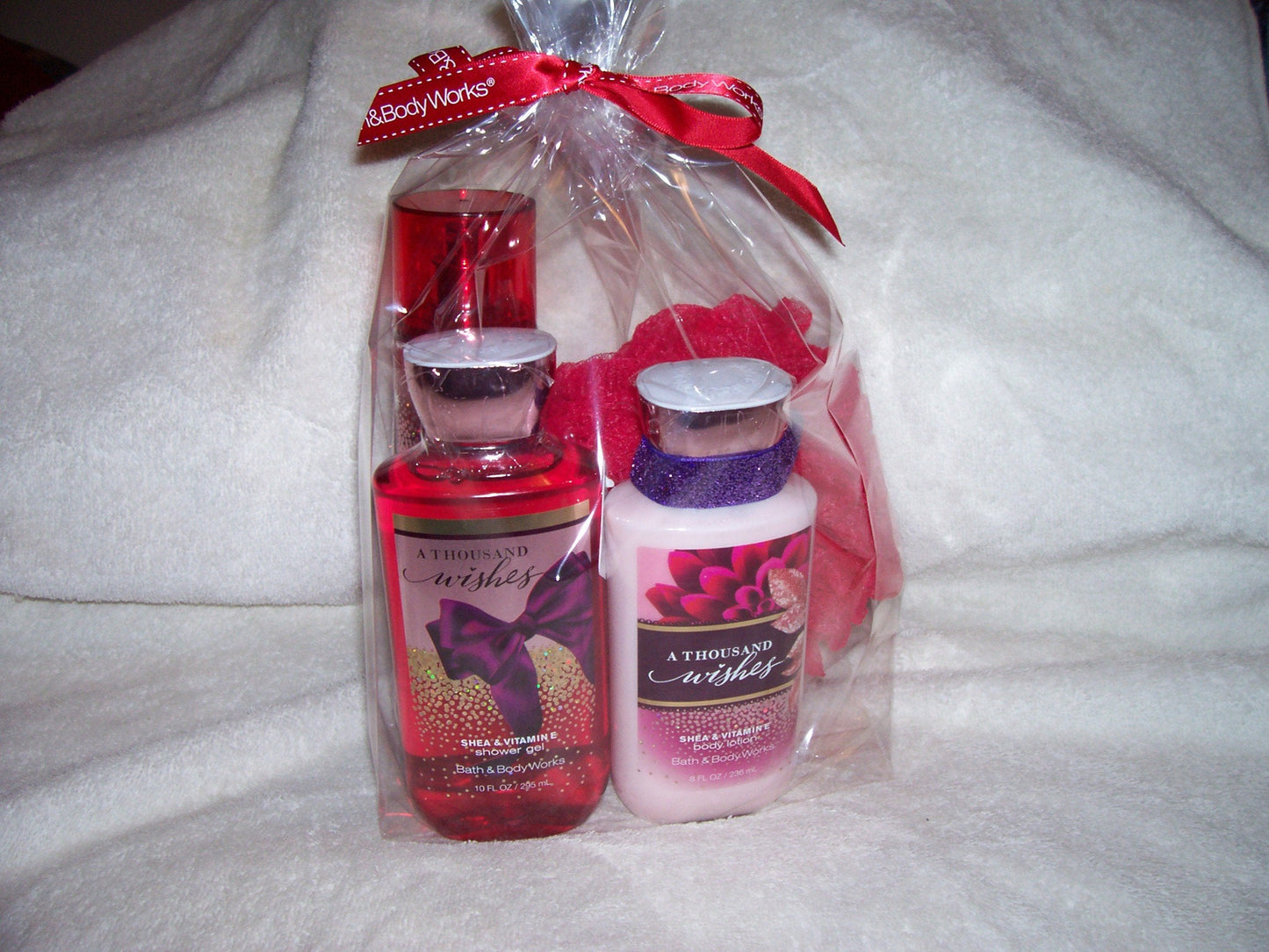 Bath and Body Works 4 Piece Gift Set A Thousand Wishes 10 Oz Shower Gel, 8 Oz Body Lotion, 8 Oz Fragrance Mist & Shower Scrubby Beauty and Personal Care Bath & Body Works
