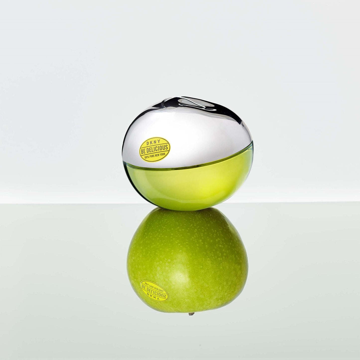 DKNY Be Delicious by Donna Karan for Women - 4 Pc Gift Set 3.4oz EDP Spray, 0.5oz EDP Spray, 3.4oz Body Lotion, Pouch Beauty & Personal Care DKNY