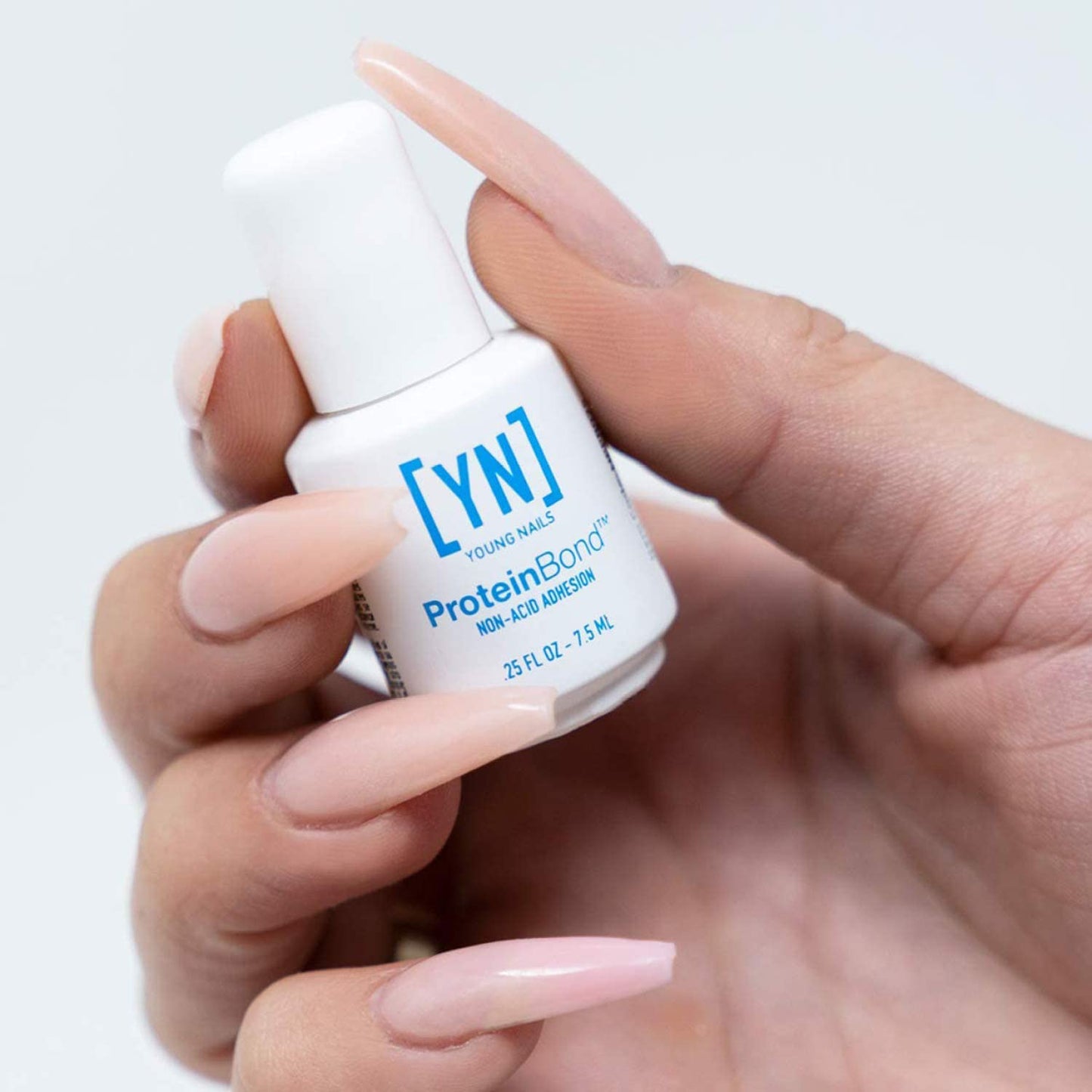 Young Nails Protein Bond - Non-Acidic Nail Primer, Enhanced Adhesion for Gel Polish & Acrylic, Nail Dehydrator, PH Bonder for Gel Nails, 0.25 oz Beauty & Personal Care Young Nails