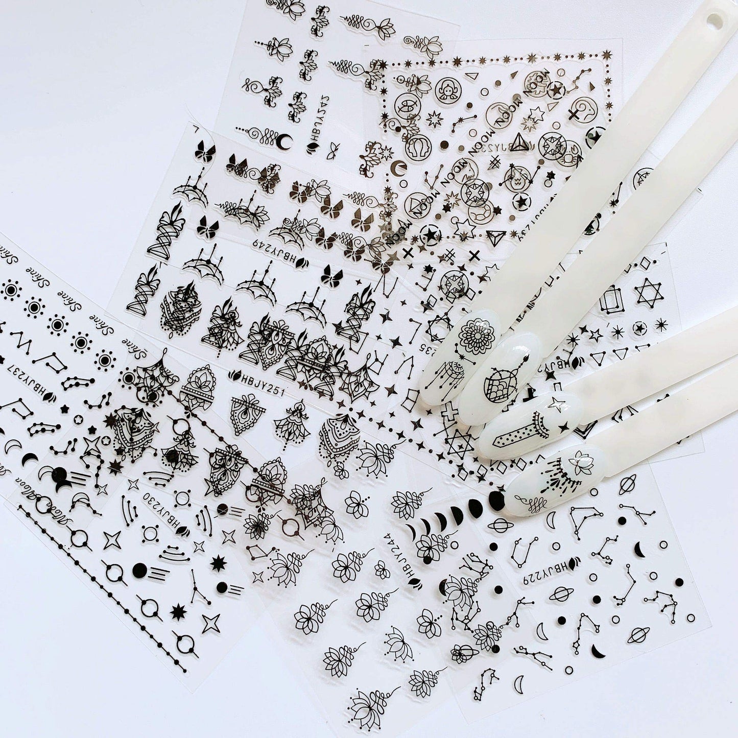 NAIL ANGEL 24 Sheets Nail Art Black Sticker Moon and Star Universal Flower Shapes Different Patterns Mix Sticker Sheets 10056 Beauty & Personal Care NAIL ANGEL