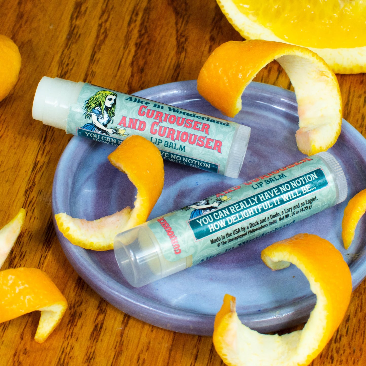 The Unemployed Philosophers Guild Alice in Wonderland Curioser and Curioser Lip Balm - Orange Marmalade Flavored, Cruelty-Free, Made in the USA Beauty & Personal Care The Unemployed Philosophers Guild