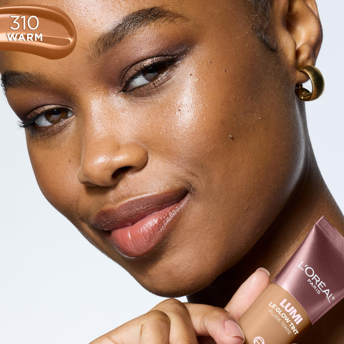 L'Oreal Paris Lumi Le Glow Skin Tint, Lightweight Water-Based Tinted Serum with Foundation-Like Coverage, Glow Illuminator, Warm 310, 0.85 Fl Oz