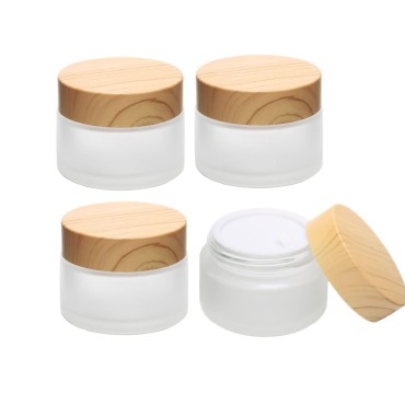4 Pack 1oz Frosted Glass Cosmetic Cream Jar Bottle Refillable Glass Face Cream Pot Cosmetics Container With Plastic Wood grain lids and Inner Liners For Face Cream Eye Cream Lip Balm Ointments Salves