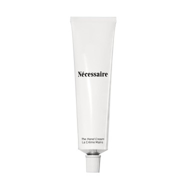 Nécessaire The Hand Cream. Barrier Treatment. Heals Dryness. 5 Ceramides. 5 Peptides. Fragrance-Free. Fast-Absorbing. Non-Greasy. Dermatologist-Tested. Hypoallergenic. Non-Comedogenic. 2.2 fl oz.